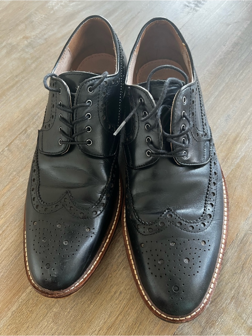 Classic Black Leather Wingtip Oxfords with Contrast Welt
